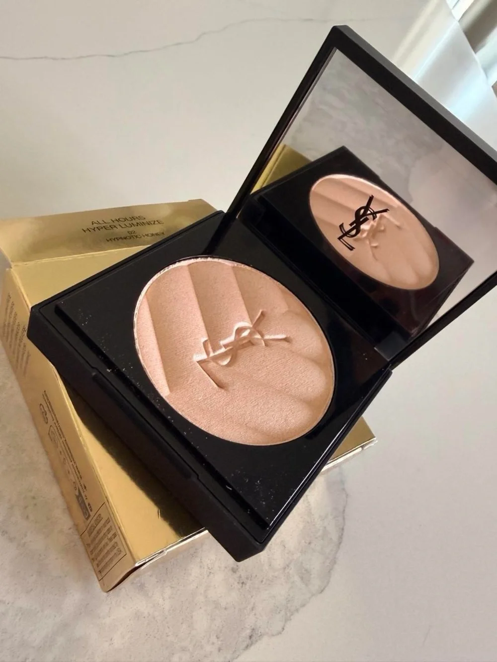 Yves Saint Laurent Gold Monogram Highlighter on White Quilted Backing